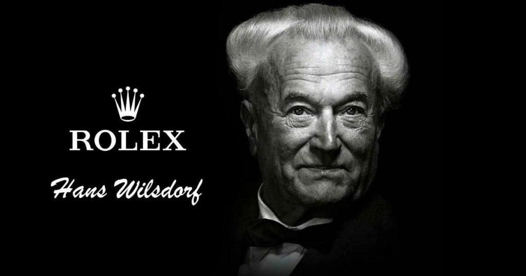 Retrato de Hans-Wilsdorf junto a su marca Rolex