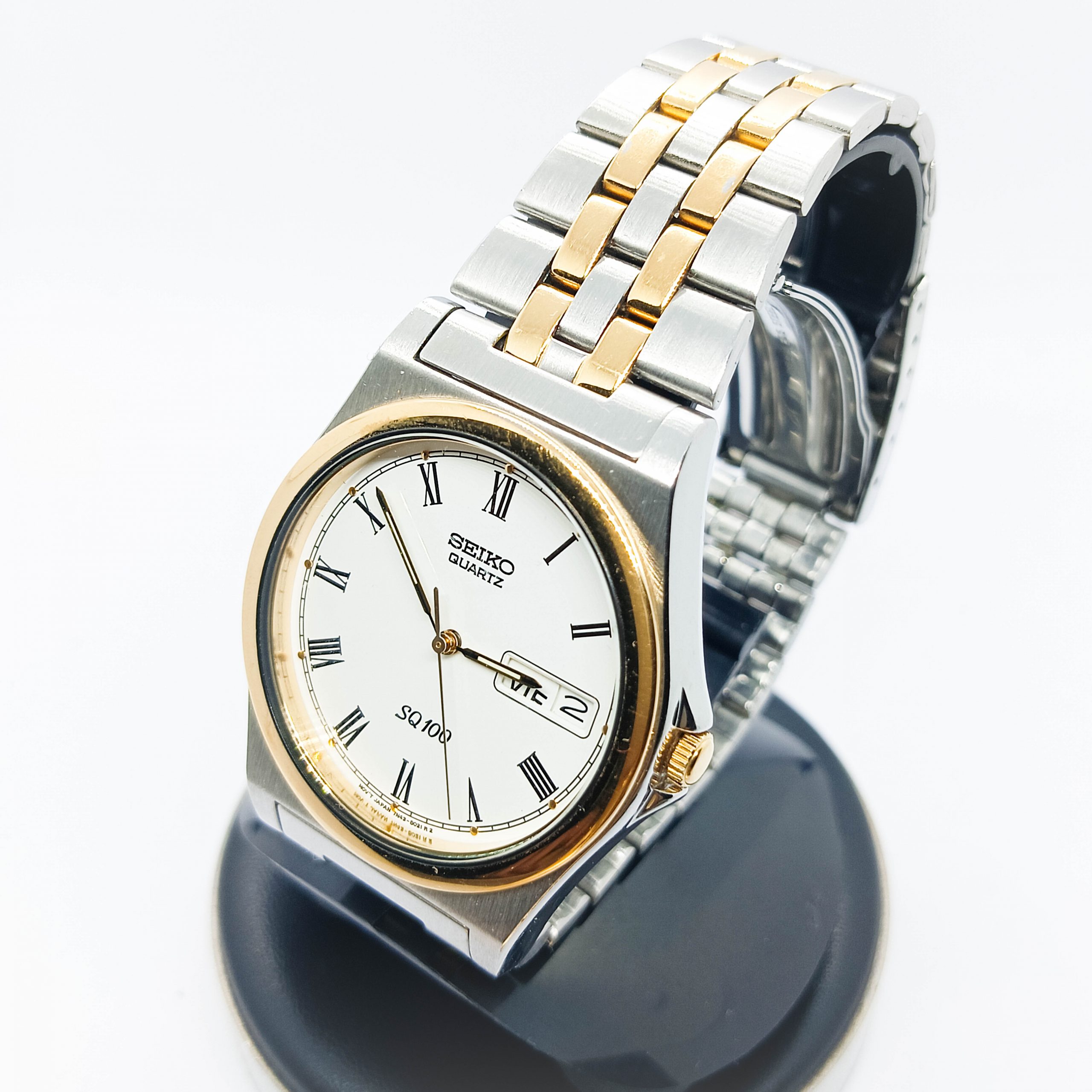 Reloj Retro Japonés Seiko SQ 100 Bicolor Quartz 90s